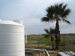 Mixing Tanks (foreground) and Sand Dunes (background)