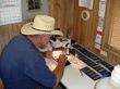 UCRA hydrogeologist examining drill cuttings