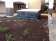 The nearly completed rainwater catchment system in the new garden.