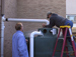 Downspout being connected to the 2,500-gallon tank