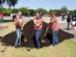 Students and Ms. Holly McCutcheon (far right), with compost for the new Xeriscape™ garden.