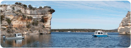 two boats performing lake surveys